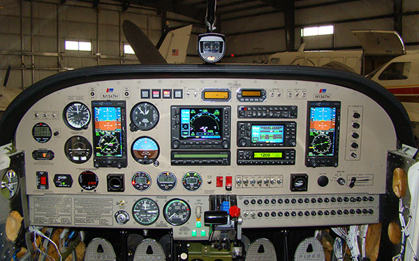Finished Skycom instrument panel with flight instruments and an avionics stack